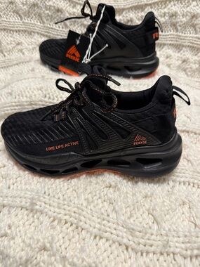 Reebok Black Sneakers with Orange Details
